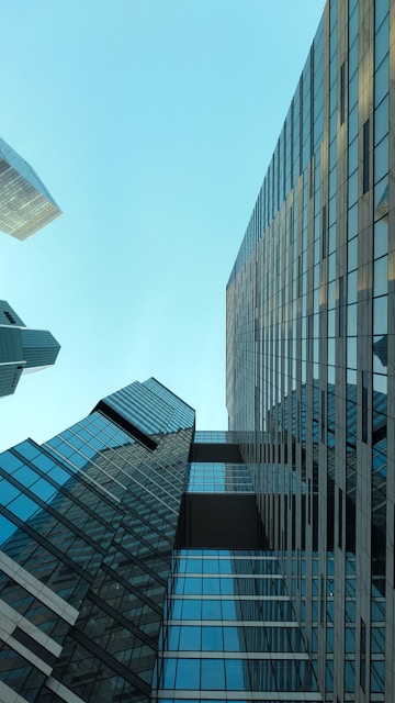 low angle photography of high rise buildings