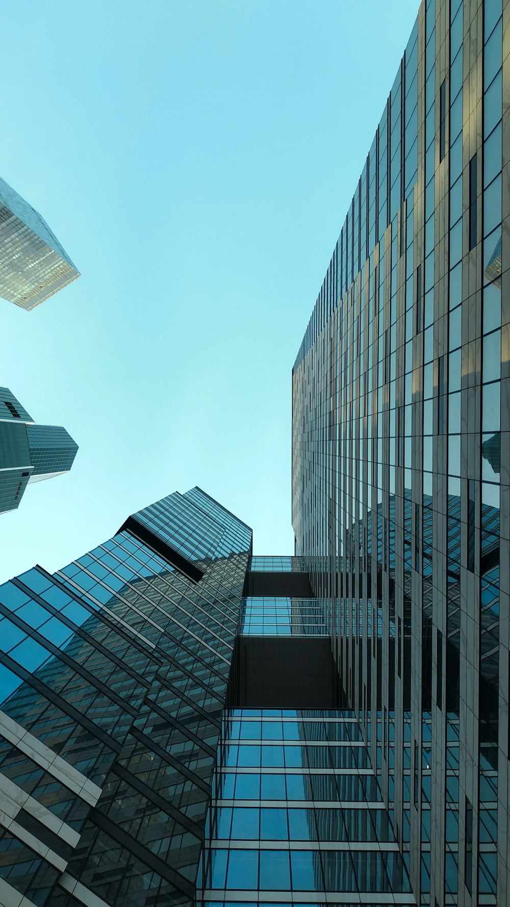 low angle photography of high rise buildings