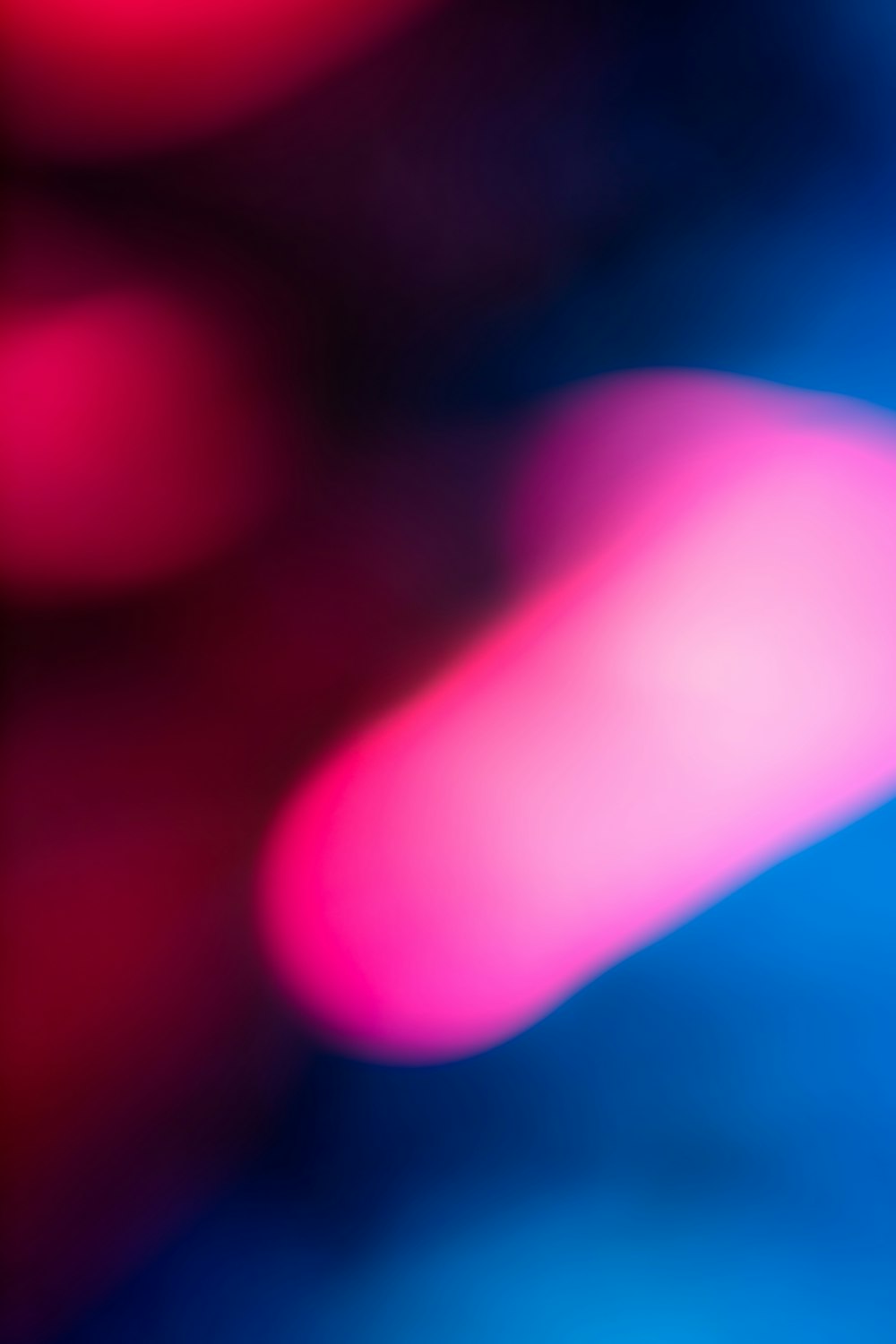 blue and red light bokeh