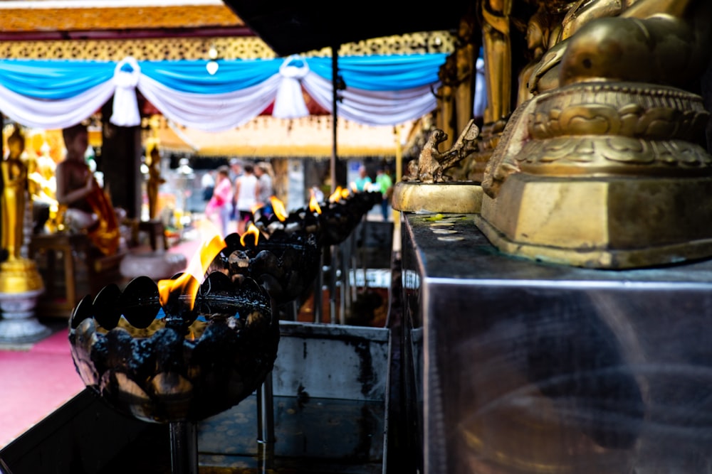 gold buddha figurine on table