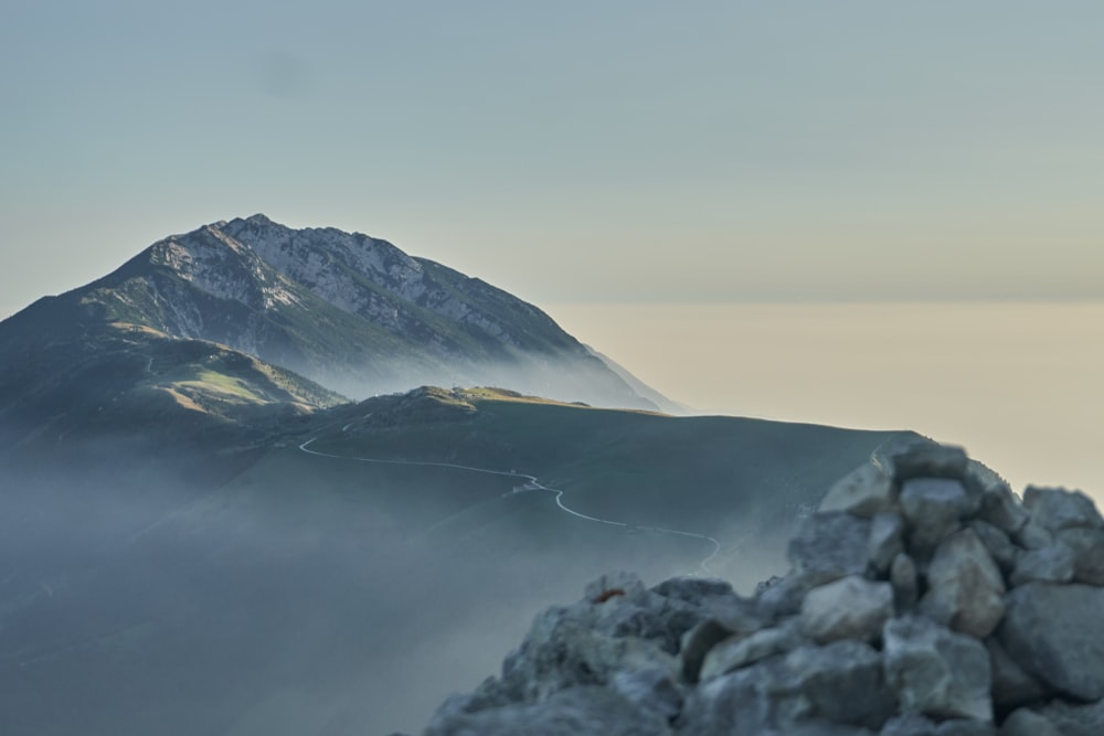 mountain range covered with clouds