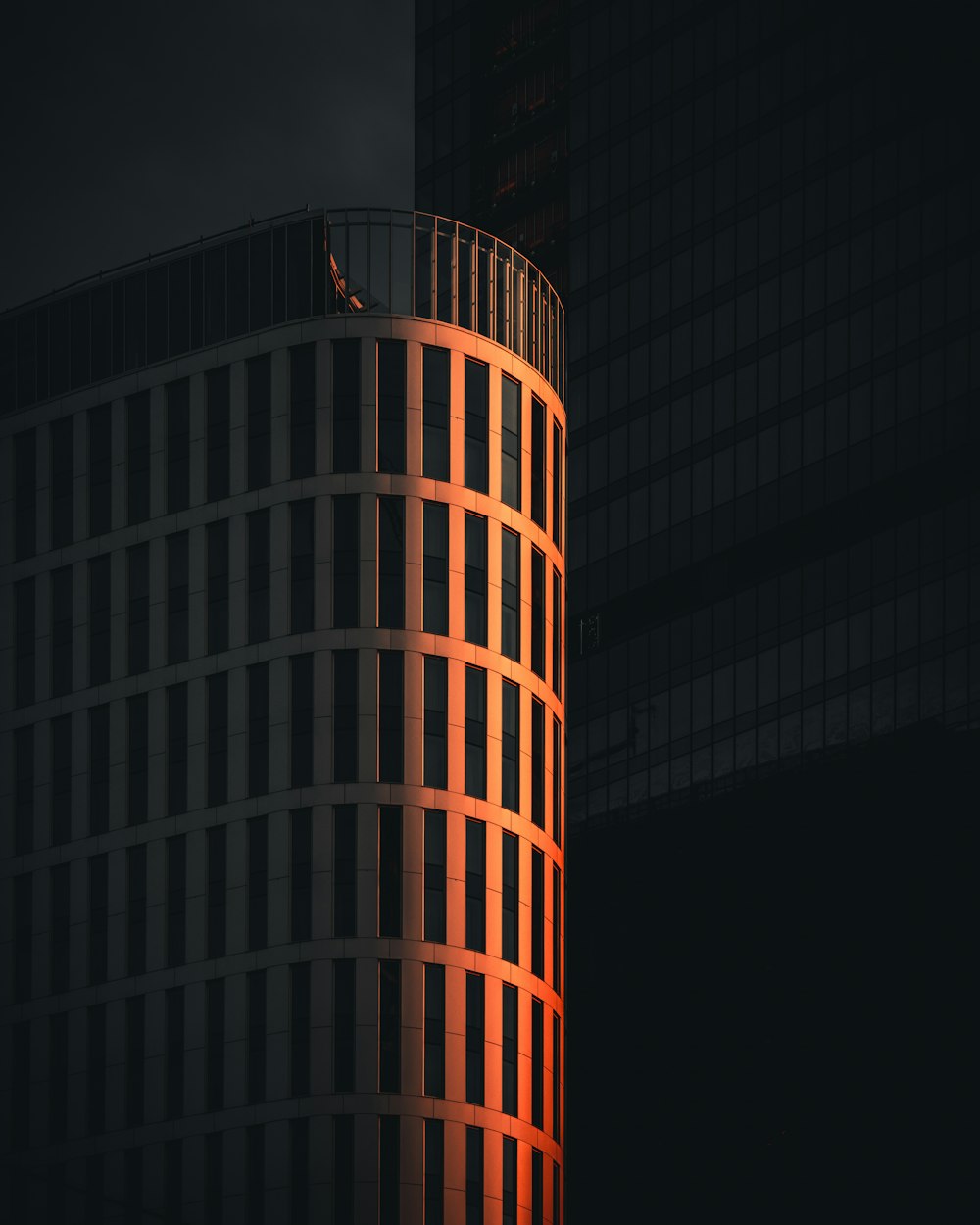 brown high rise building during night time