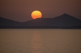 silhouette of mountain during sunset