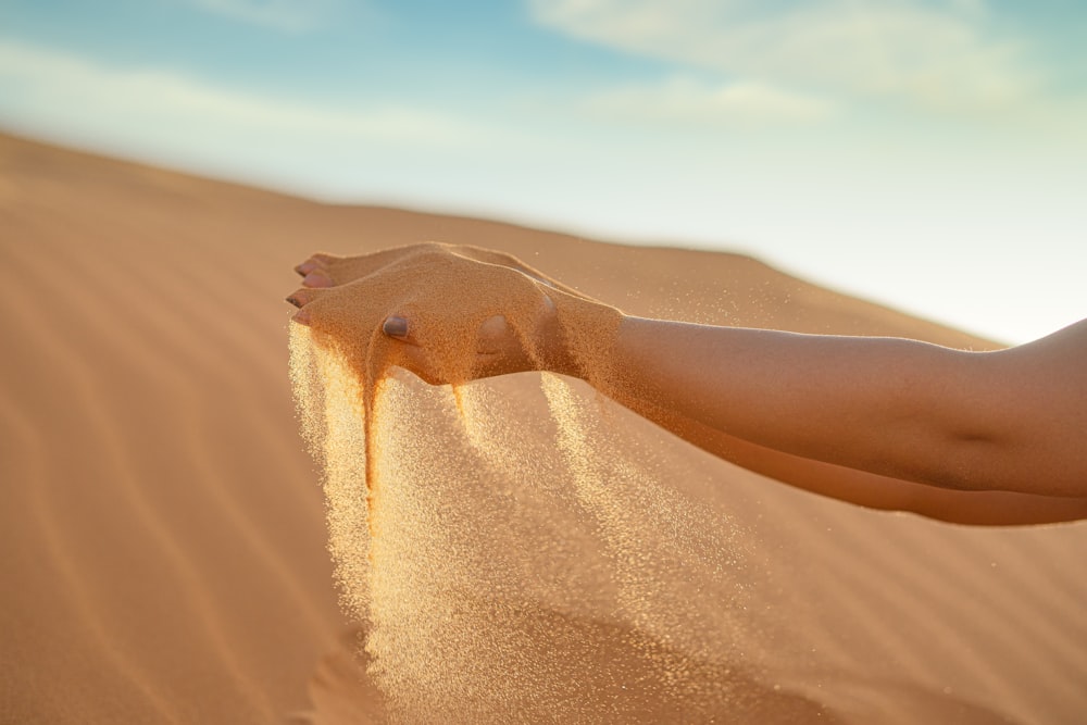 person on desert during daytime