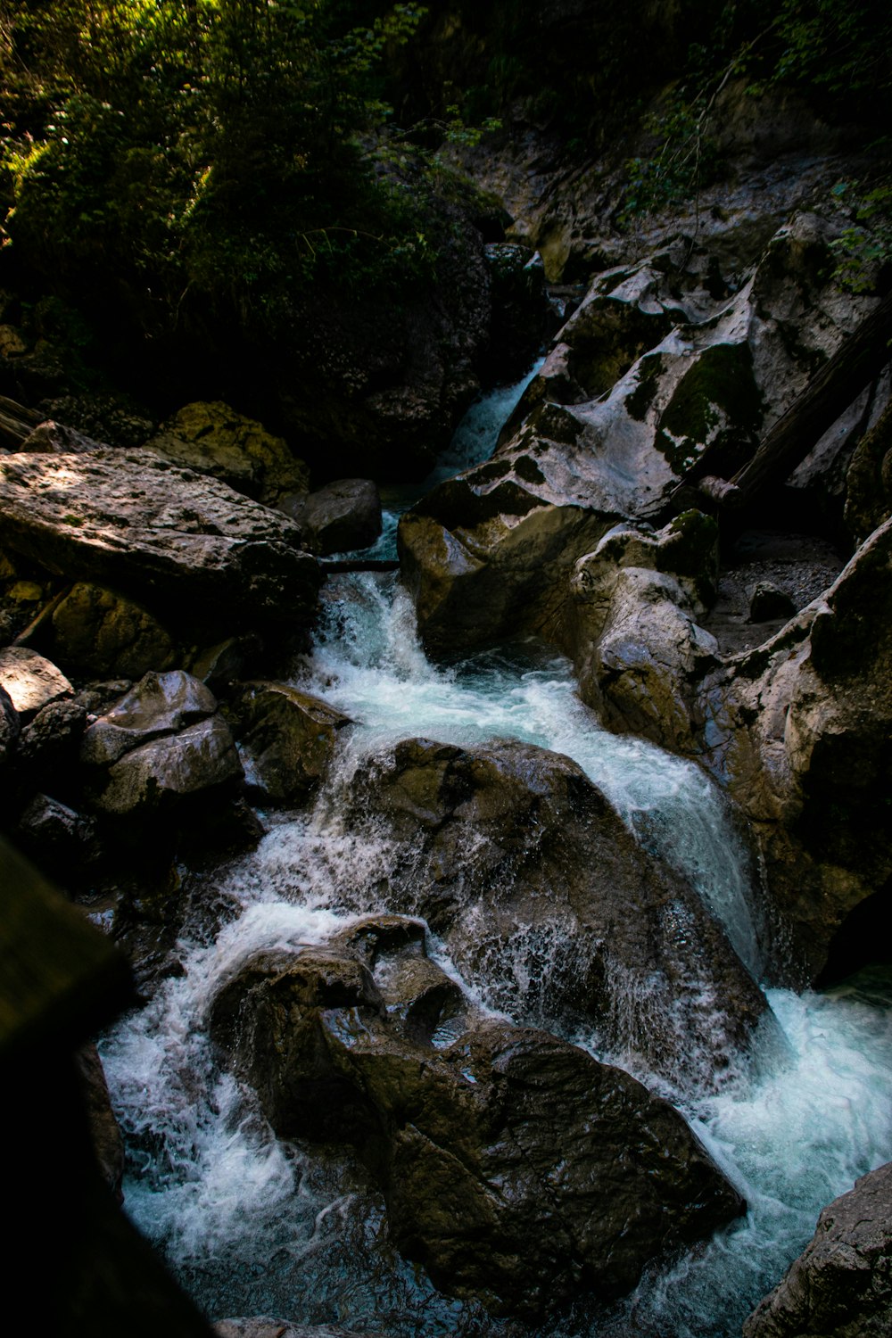 water falls on rocky mountain