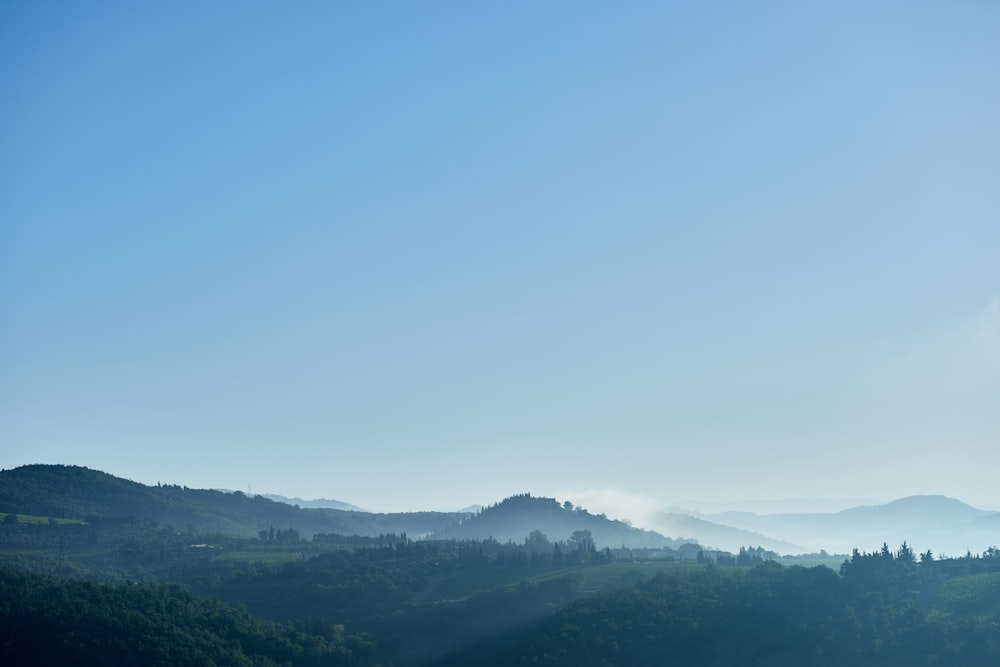 green mountains under blue sky during daytime