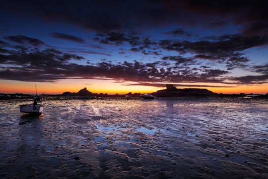 body of water under cloudy sky during sunset in Santec France