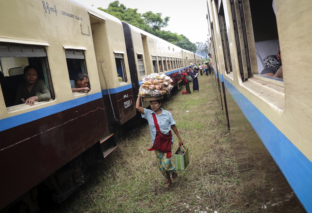 people in train during daytime