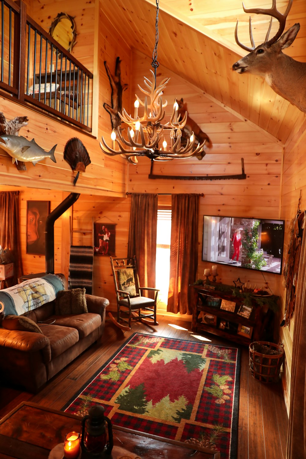 living room with brown wooden cabinet and couch