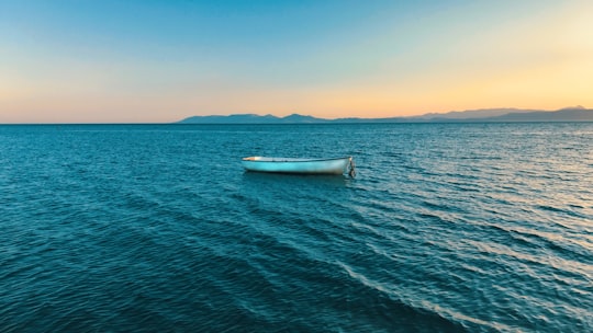 white boat on blue sea during daytime in Ayvalık Turkey