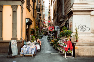 red and white food stall in the middle of the street