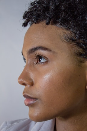 Close-up of a client’s glowing skin after a rejuvenating facial at Glow Haven.