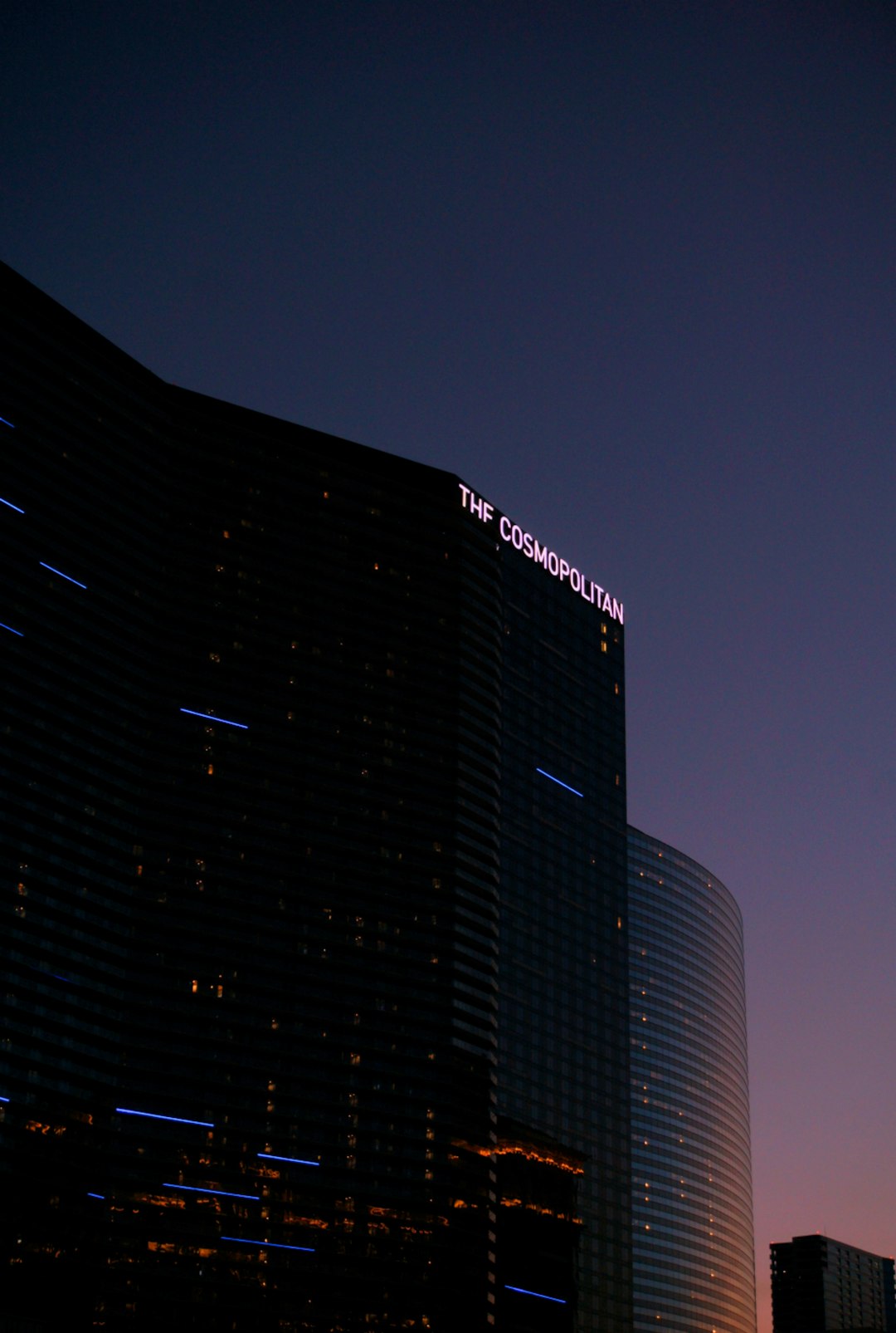 black high rise building during night time