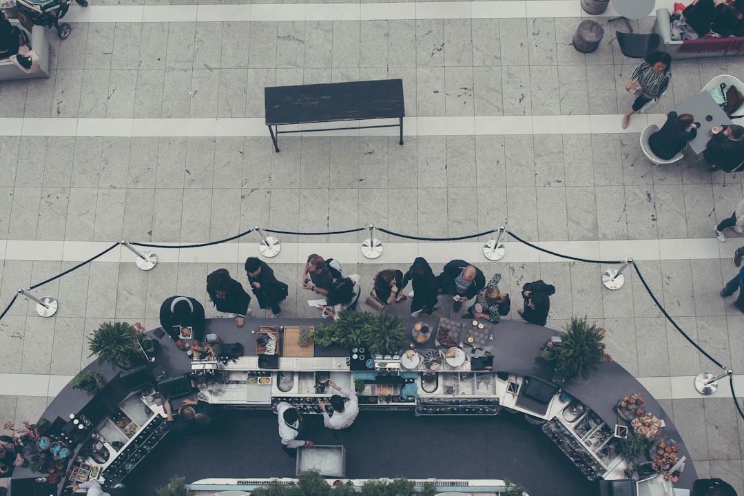 people sitting on black chairs