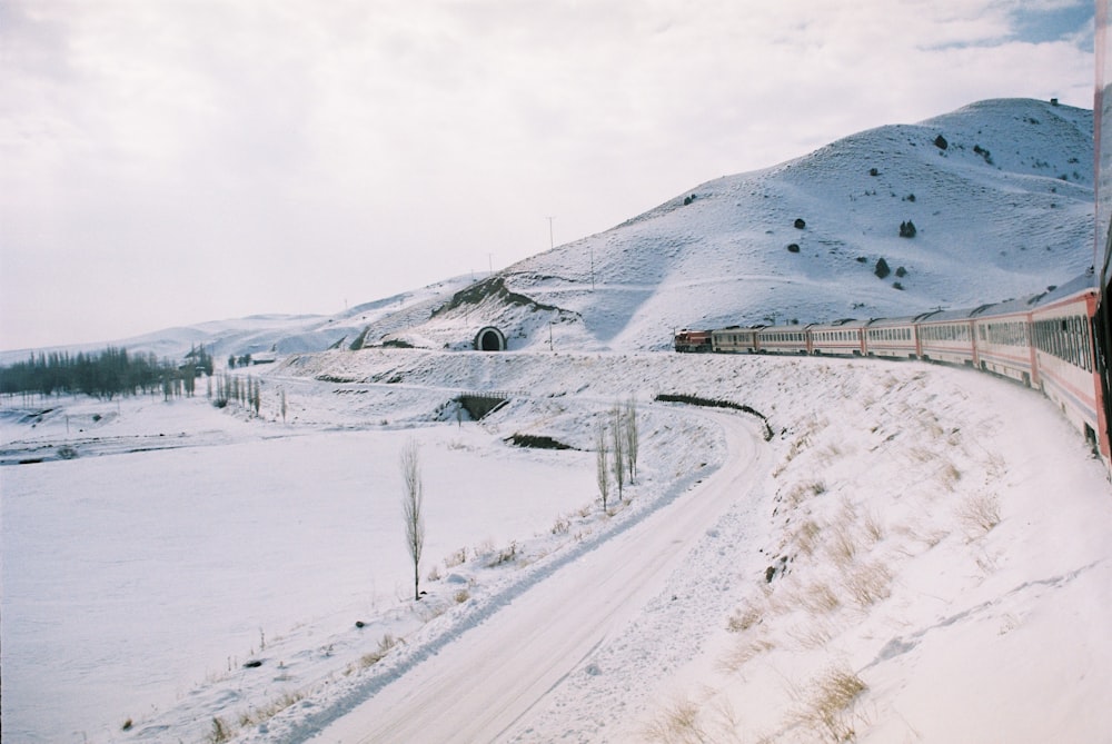 snow covered mountain during daytime