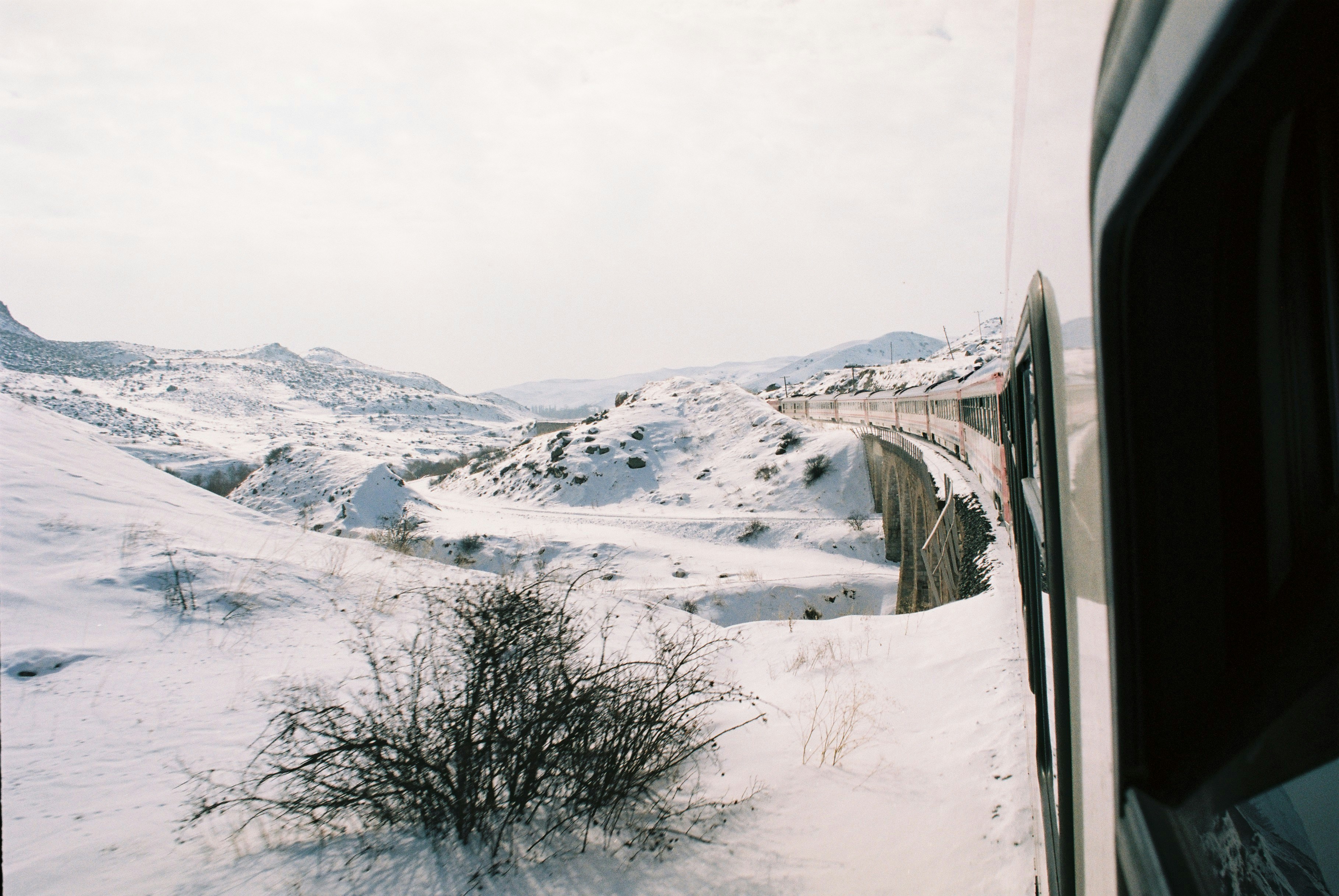 snow covered mountain during daytime