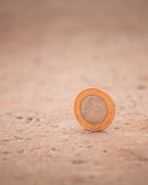 A mint error coin featuring a clipped planchet with irregular edges visible.