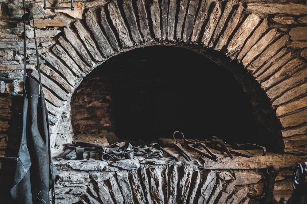 brown brick tunnel with white and black stones