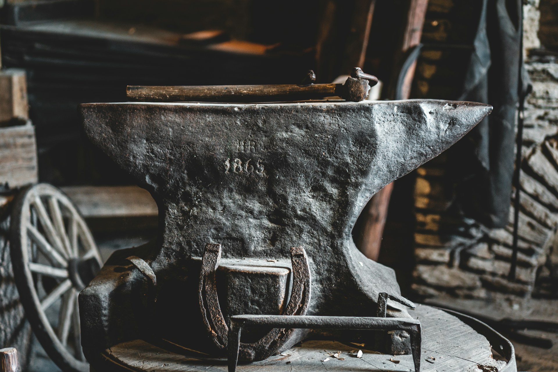 black metal tool on brown wooden table
