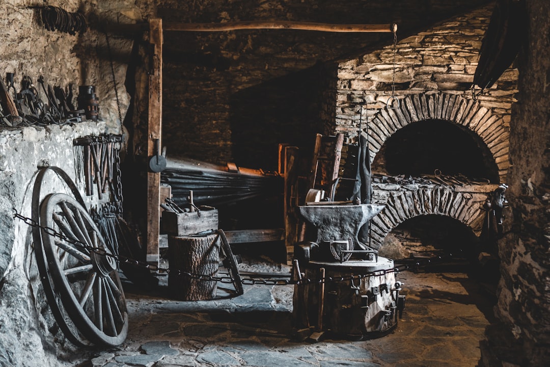 brown wooden wheel on brown wooden table, went for a trip to the Marksburg and fell in love with the forge. take a deep 