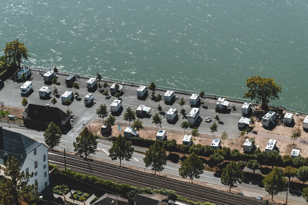 aerial view of city buildings near body of water during daytime