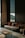 brown and white couch beside window