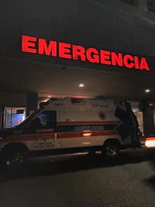 white and red ambulance van