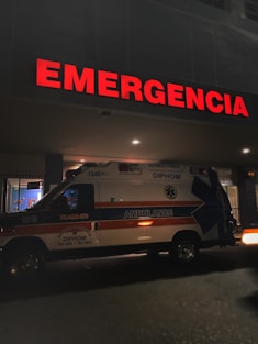 white and red ambulance van