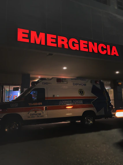 white and red ambulance van