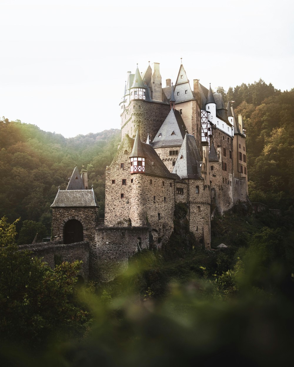 grey concrete castle on green grass field during daytime