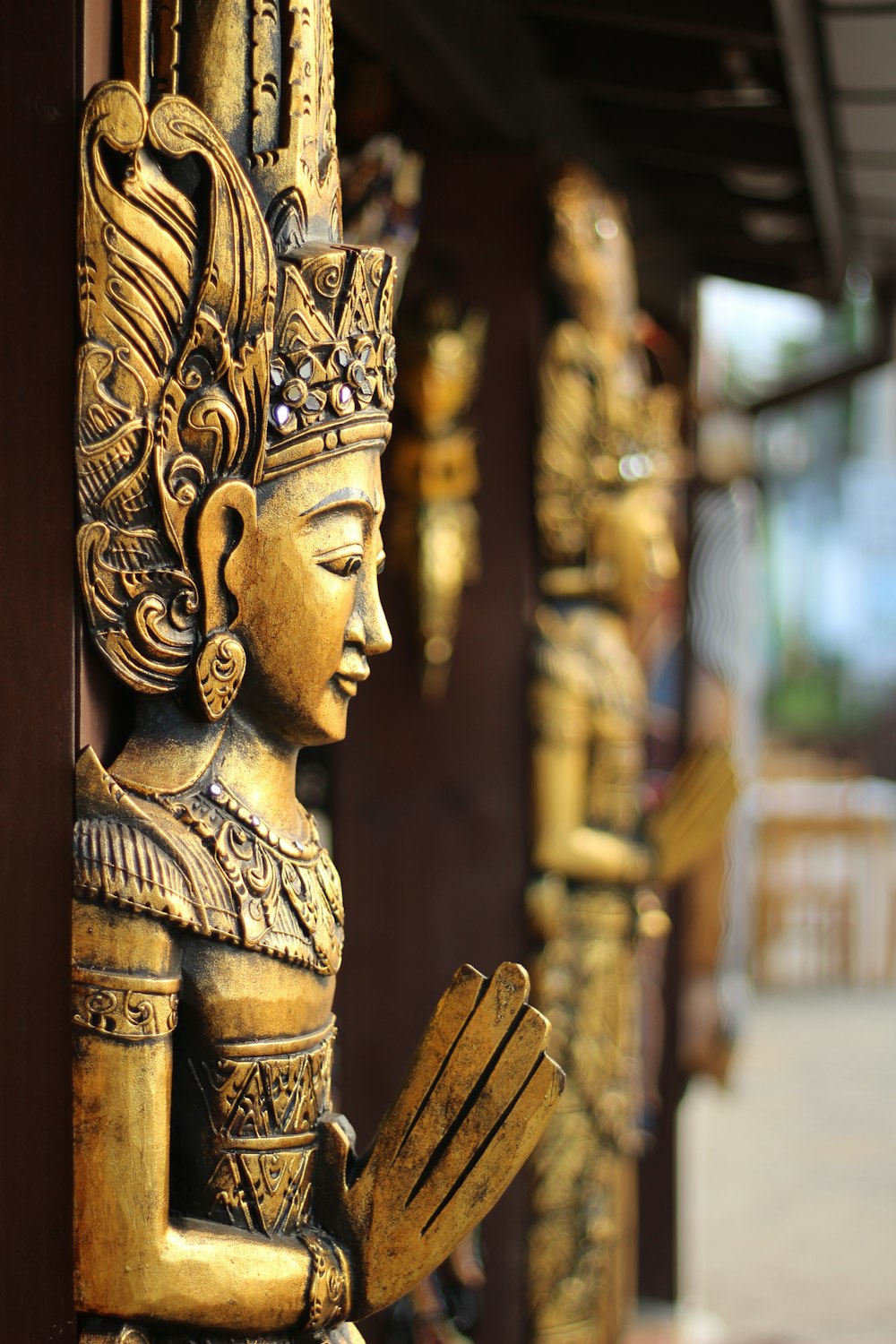 gold buddha statue during daytime