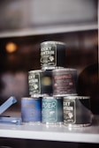 Stacked vintage tins in a soft natural light, emphasizing their classic look and sturdy build.