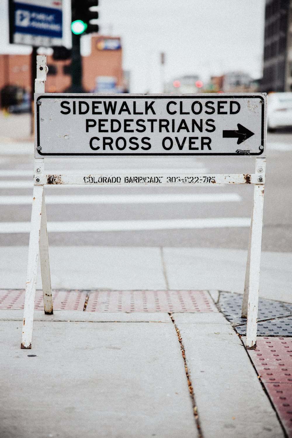 white and black wooden signage