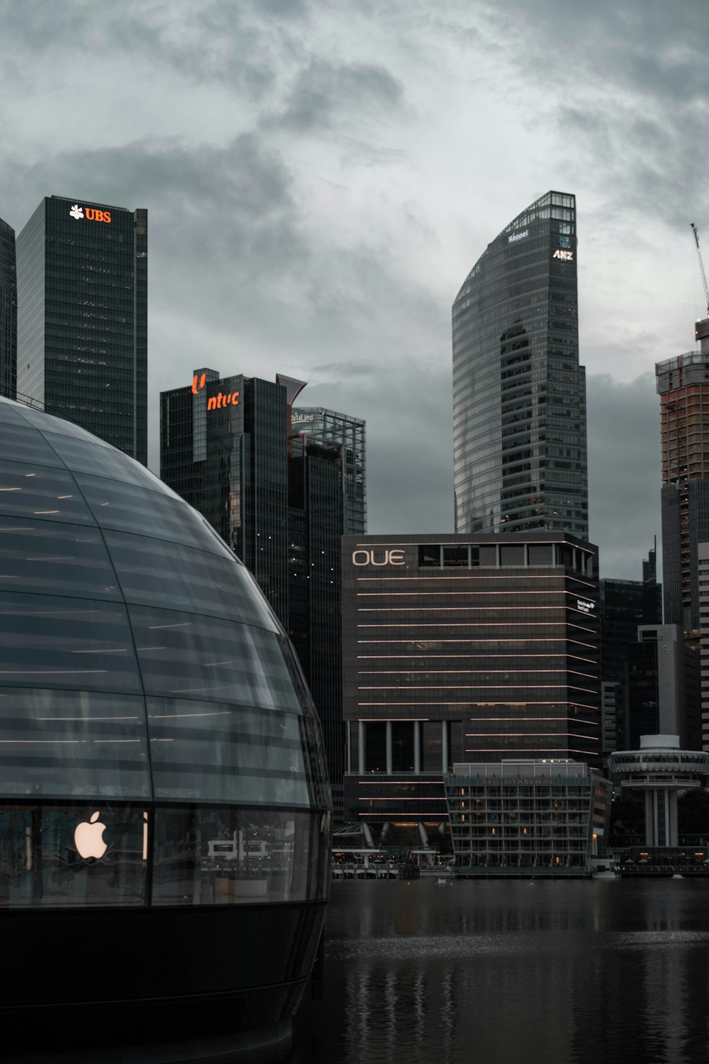 glass building under cloudy sky during daytime