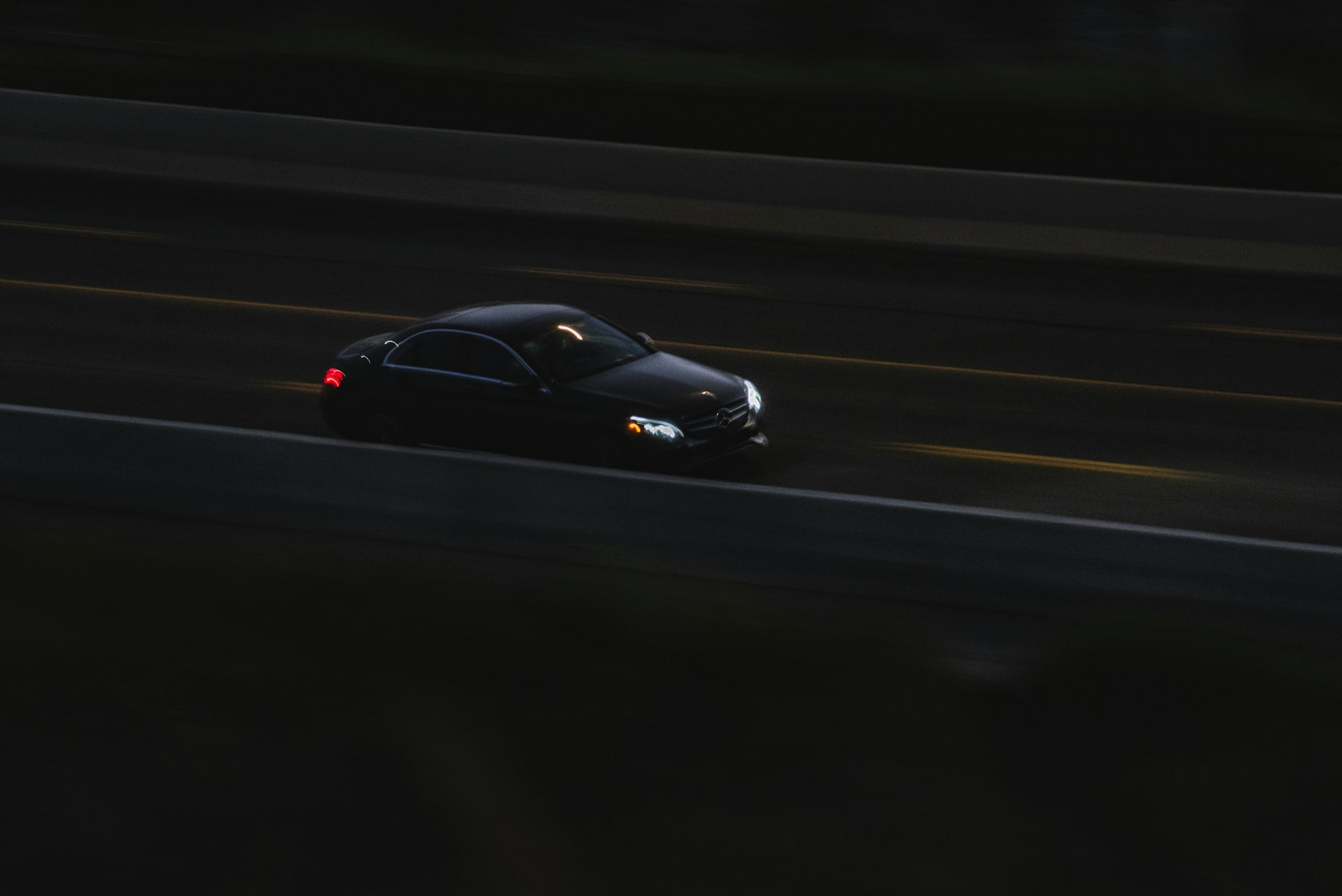 black sports car on road