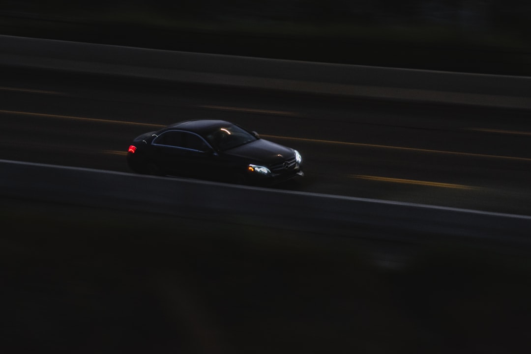 black sports car on road