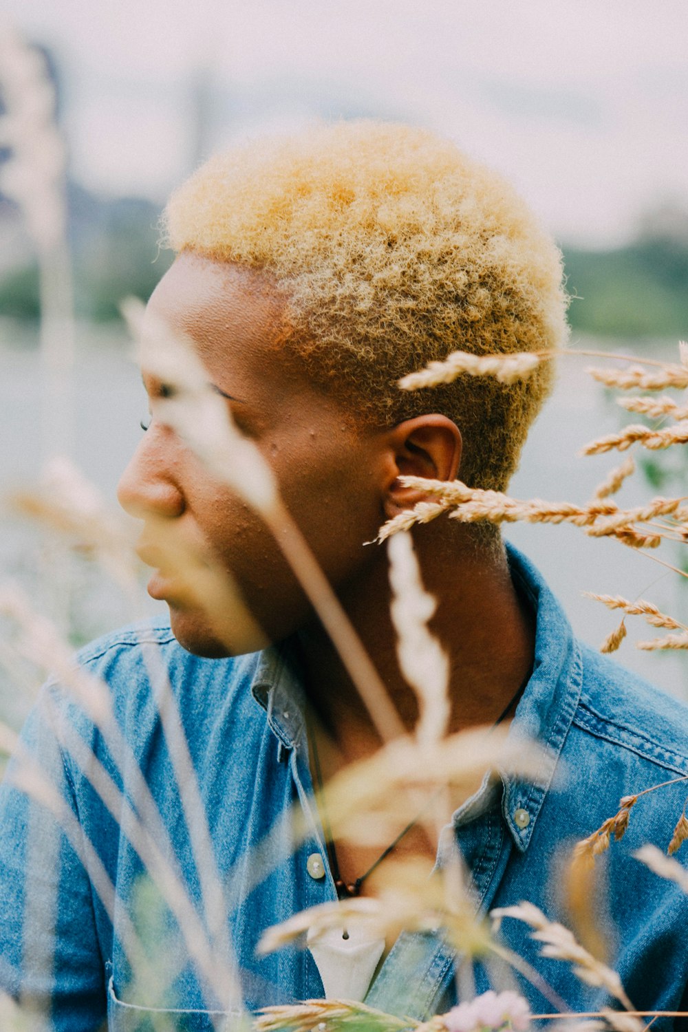 man in blue denim jacket