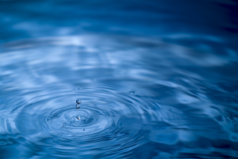 water drop in blue water