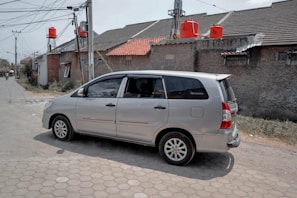 A family taxi van parked in a residential neighborhood in Hawalli, Kuwait.
