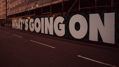 a sign on the side of a road
