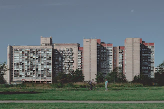 A building manager talking with residents in a friendly meeting.