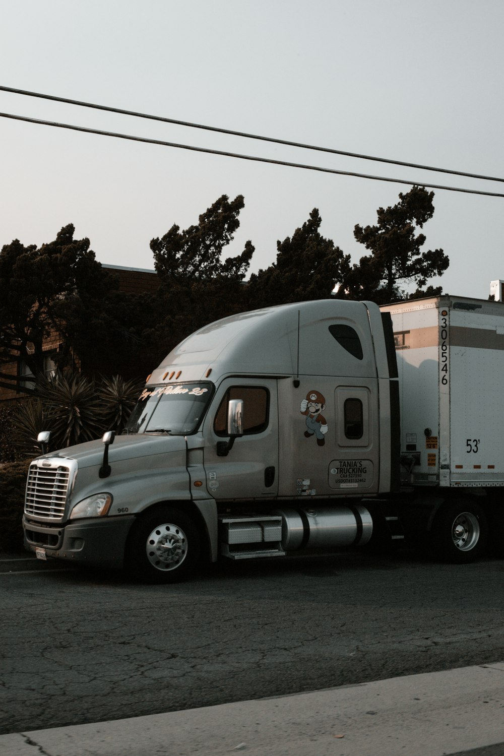 white truck on road during daytime