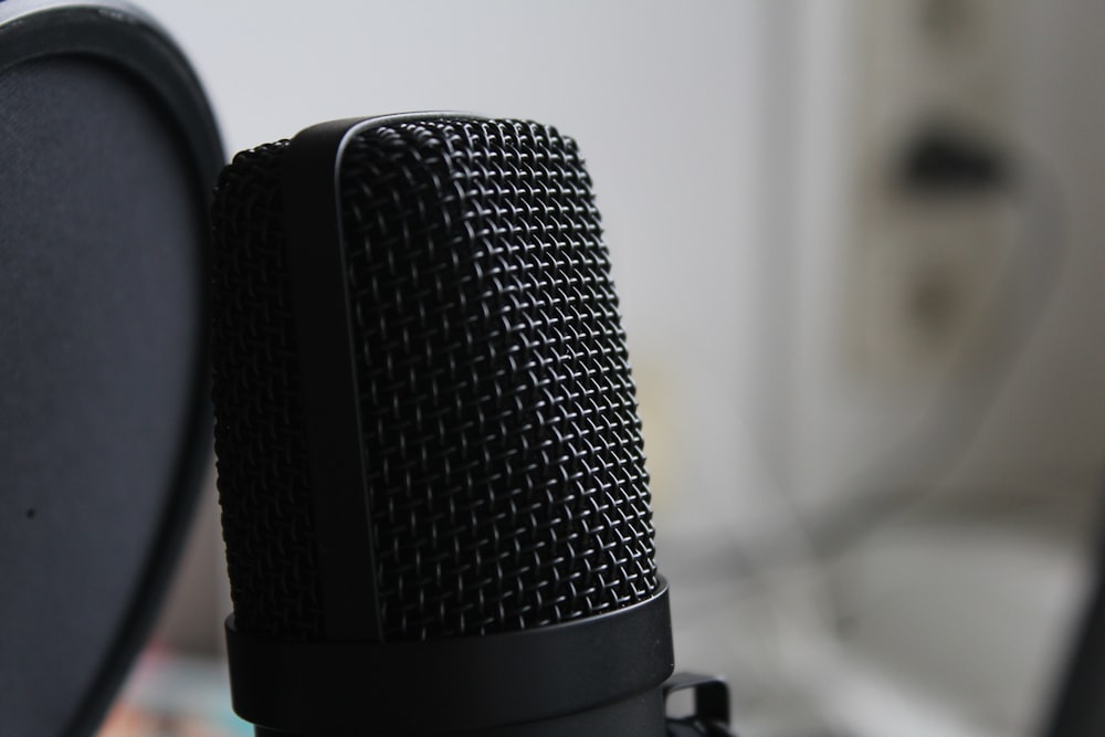 black microphone on white table