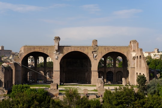 brown concrete bridge under white sky during daytime in Palatine Museum on Palatine Hill Italy