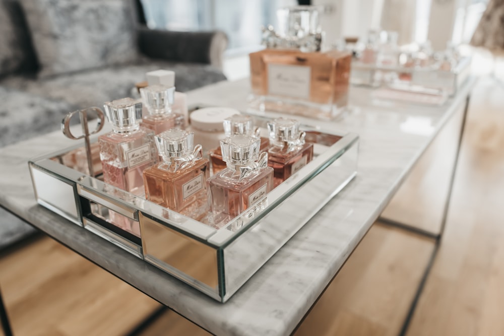 clear glass bottles on white table