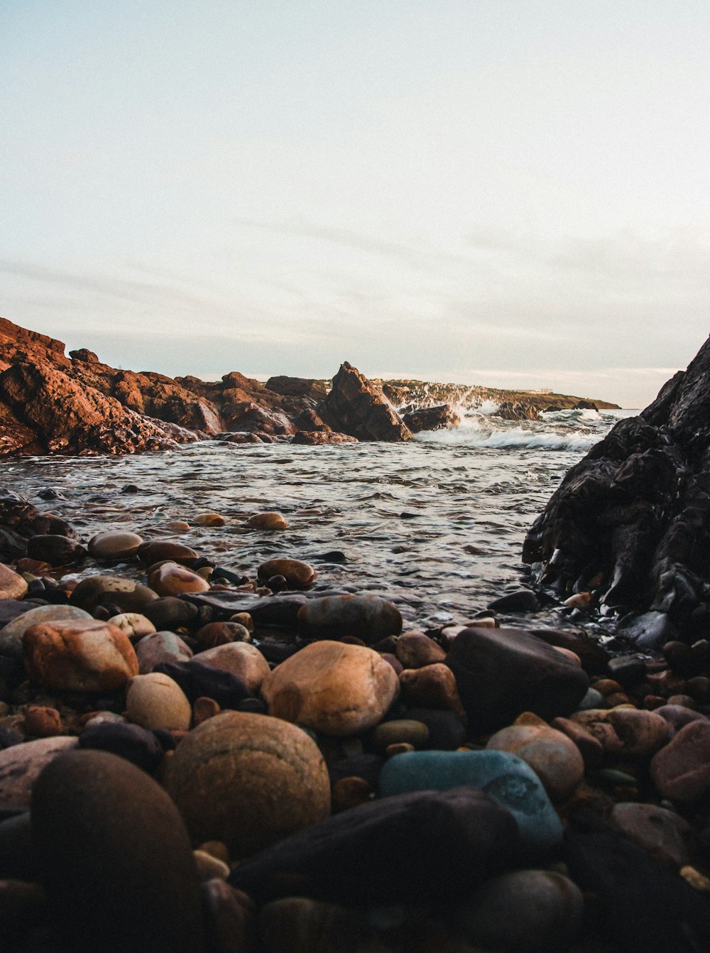 rocky shore with rocks on the side