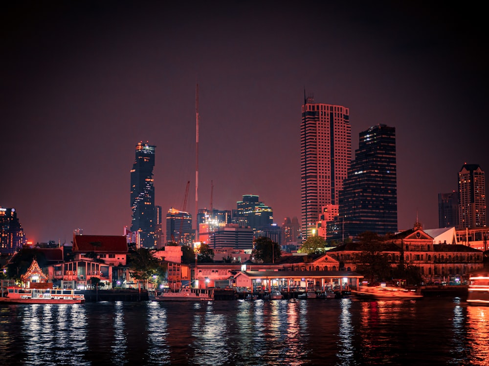 city skyline during night time