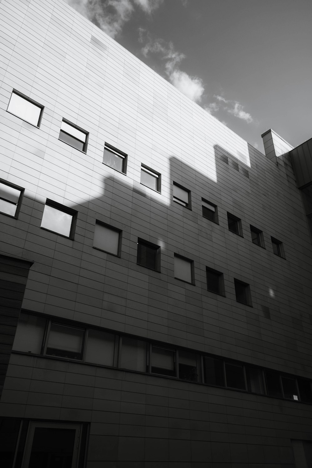 grayscale photo of concrete building