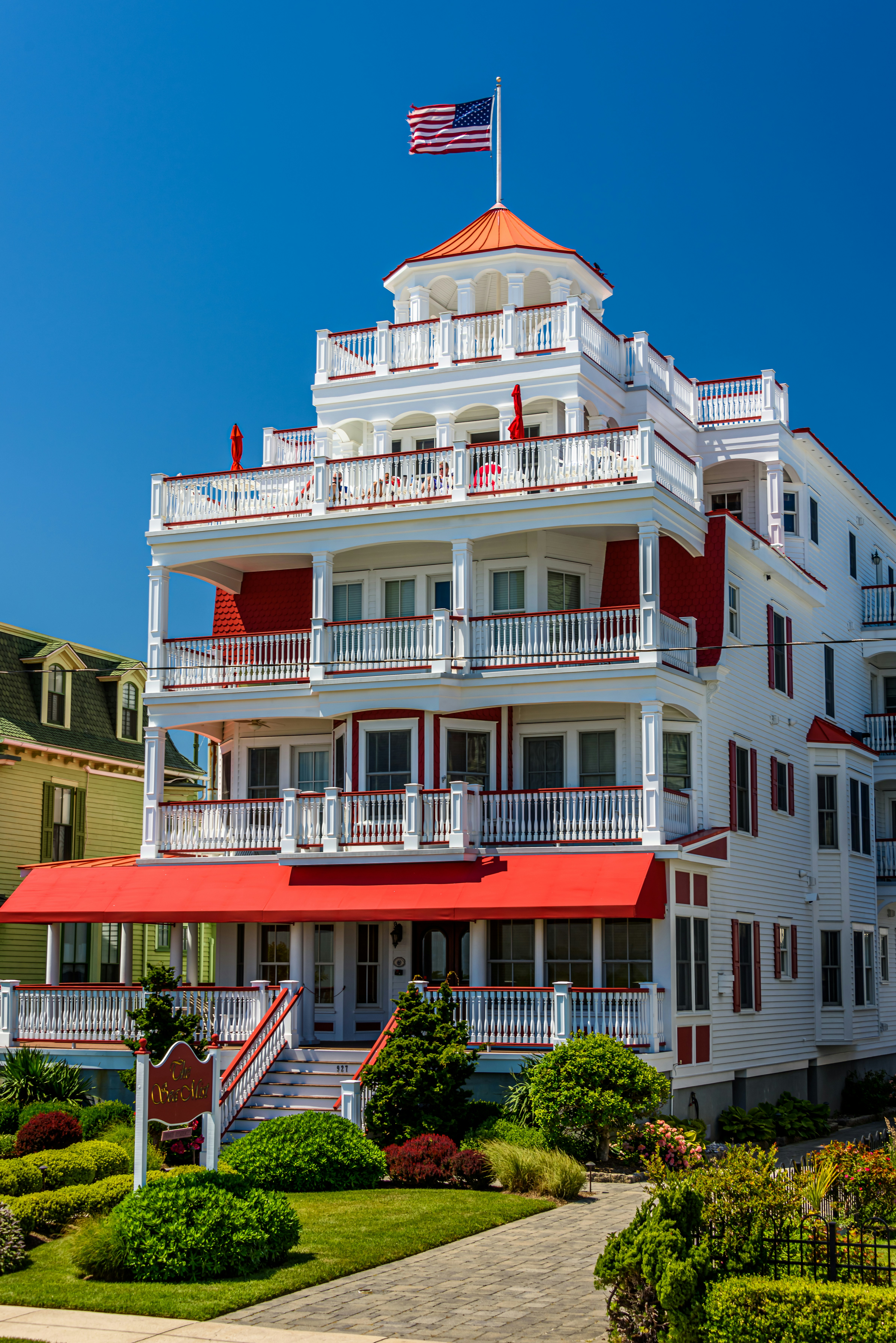 The old majestic Victorian Era homes that line the shore in Cape May New Jersey are enjoyed by the many tourists that visit this quaint town.