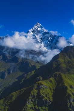 green and brown mountain under blue sky during daytime
